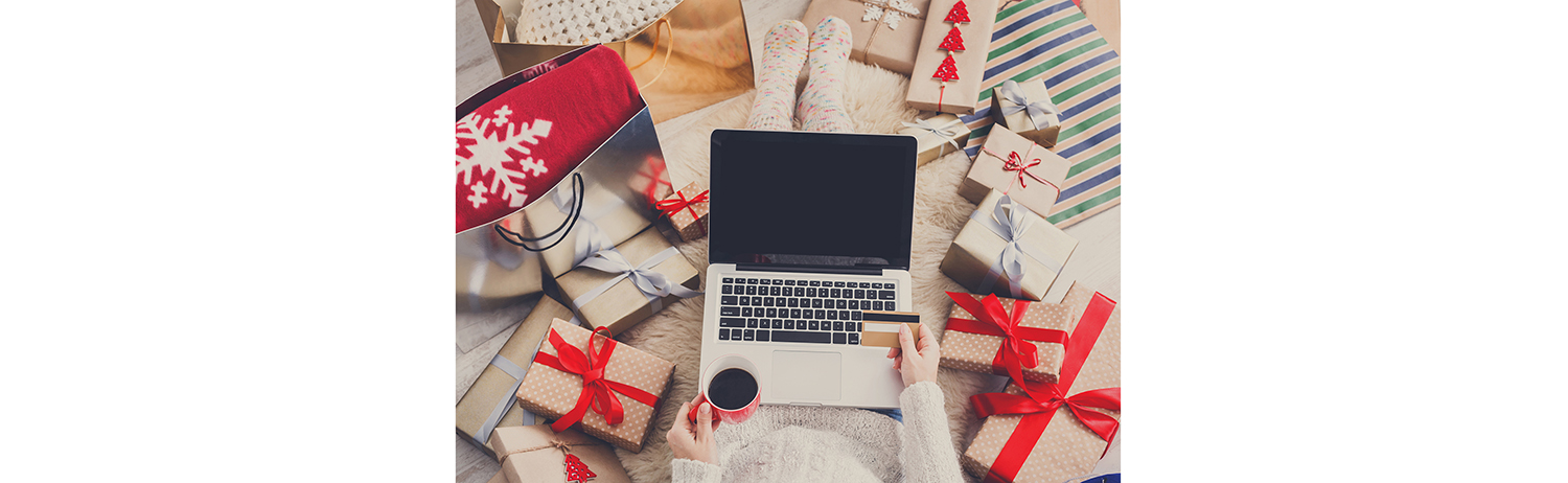 Woman online holiday shopping