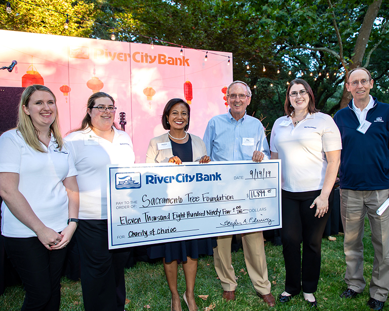River City Bank presents check to the Sacramento Tree Foundation’s Dr. Janine Bera and Ray Trethaway
