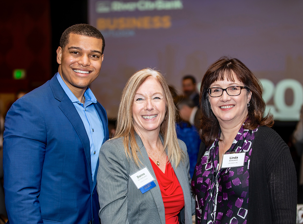 Kennard Boutte’-Nears and Linda Bergaus of Life -Assist with River City Bank’s Donna Sutherland at the Business Outlook Event